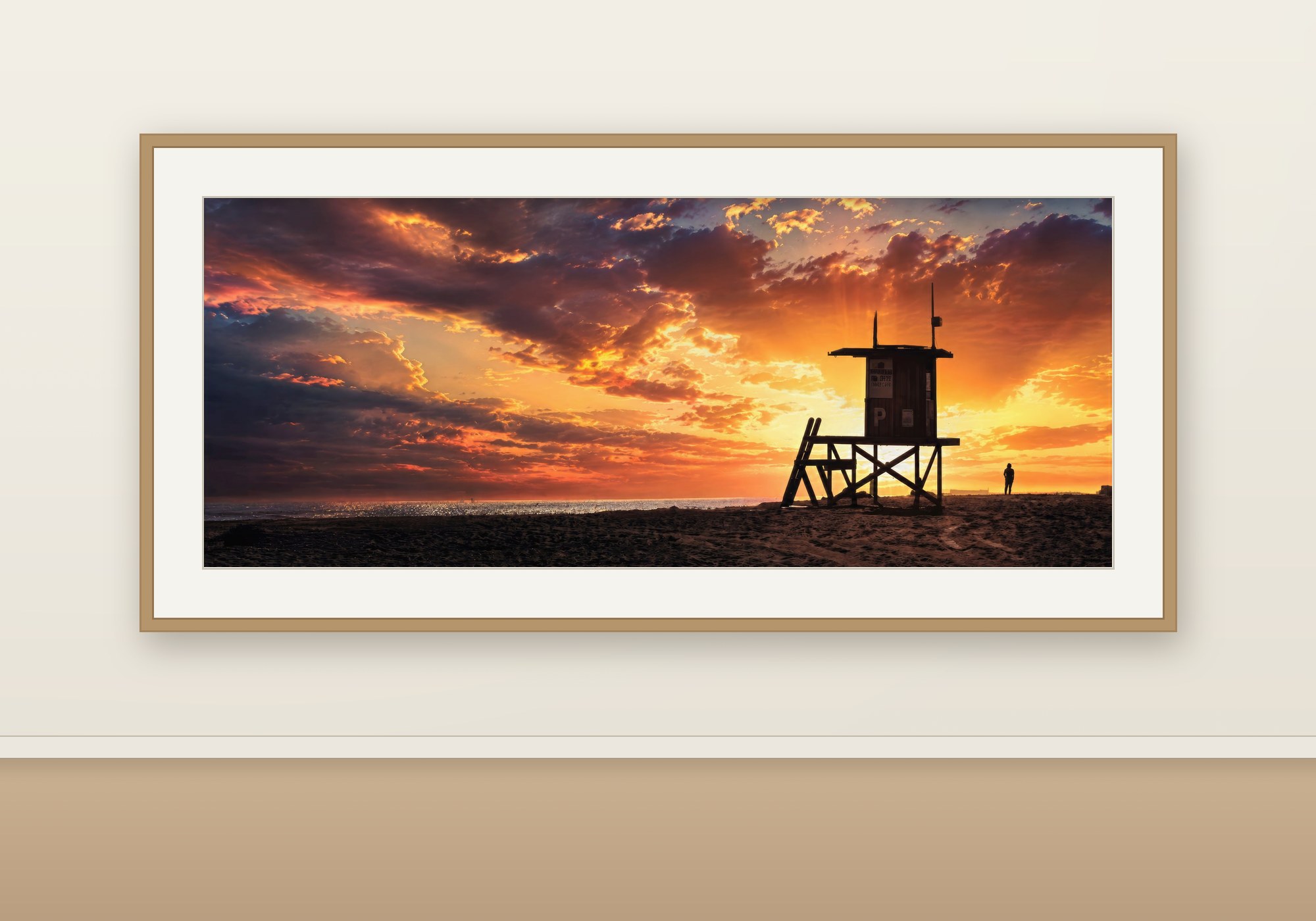Newport Beach winter sunset panorama framed in oak, shown to scale on a warm neutral wall